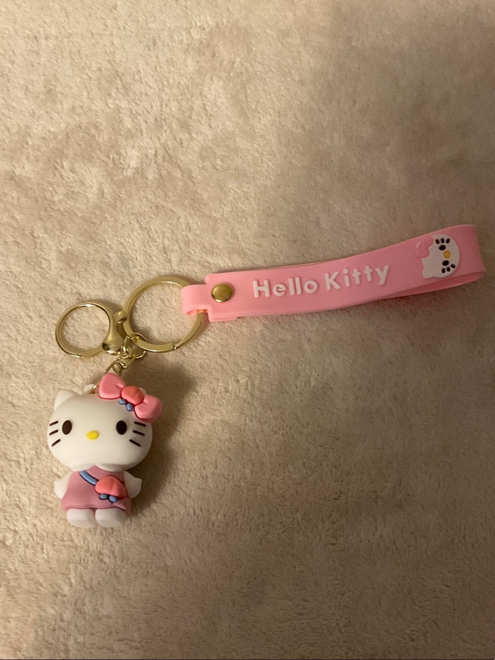 Hello Kitty Pink Silicone Wrist Strap Keychain with White Kitty Charm